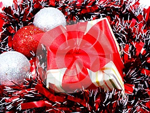 Decorations with red and white tinsel chistmas background