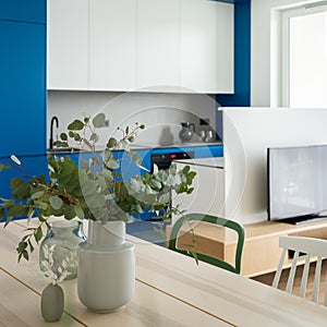 Decorations on wooden table in open kitchen