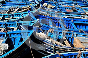 Decorativ blue rowing boats, lying in the port of Essaoiera, Morocco