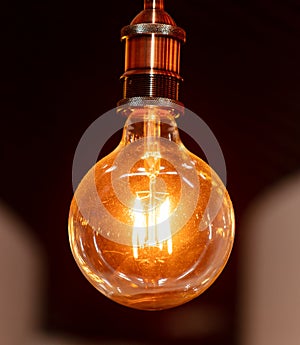 Decorative antique edison style filament light bulbs hanging from ceiling