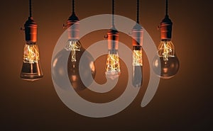 Decorative antique edison style light bulbs against wall background