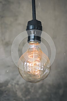 Decorative antique edison style light bulbs.Vintage light bulbs hanging from the ceilings