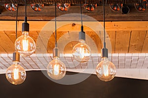 Decorative antique LED tungsten light bulbs hanging on ceiling