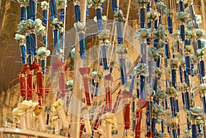 Decorative arrangements of glass tubes filled with colored liquids.