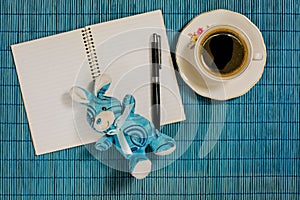 Decorative background coffee, notebook, pen and breackfast photo