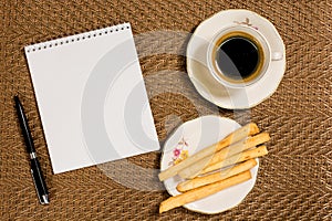 Decorative background coffee, notebook, and breakfast