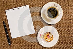 Decorative background coffee, notebook, and breakfast