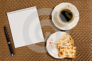 Decorative background coffee, notebook, and breakfast