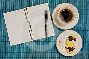 Decorative background coffee, notebook, pen and breackfast
