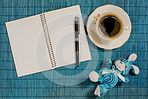 Decorative background coffee, notebook, pen and breackfast