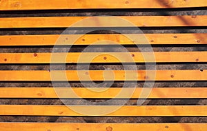 Decorative background of horizontal orange wooden slats