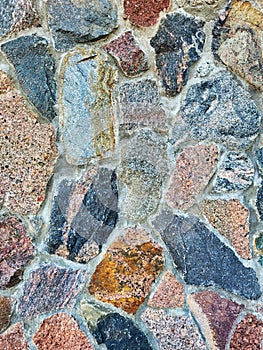 Decorative background. Stone wall background texture photo. Background texture of stone. Colorful small stones in the soil after