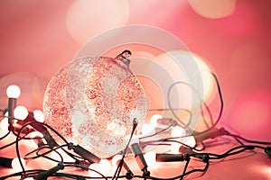 Decorative ball with garland lights for christmas holiday