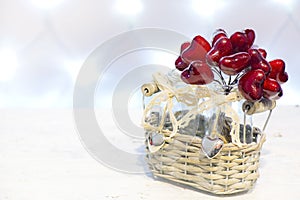 Decorative basket with glass bottles and hearts