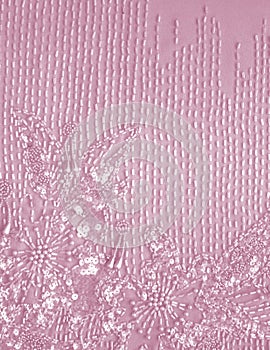 Decorative beadwork on pink photo