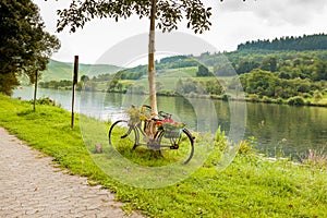 Decorative bike by the river. Germany