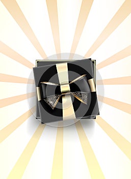 Decorative black gift box with golden bow and long ribbon. Vector