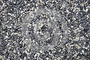 Decorative black and white pebble stones as background