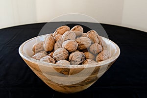 A decorative bowl with Walnuts - cracking nuts is a popular and traditional custom in the Christmas time