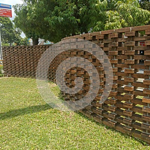 A decorative brick wall arranged in a hollow pattern.