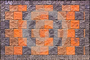 Decorative brick wall from concrete facing tiles as background or texture