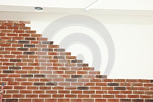 Decorative bricks with tile leveling system on white wall