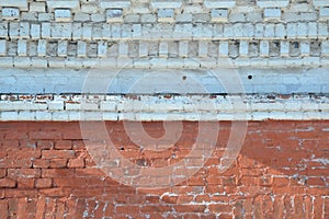 Decorative brickwork. Two-tone vintage grunge brick wall made of red and gray-white bricks. Background for home or office