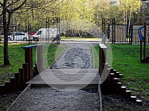 Decorative bridge on the track in the Park