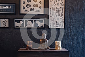 Decorative Bronze Budha Trinket on Wall Shelf of a Cafe Shop