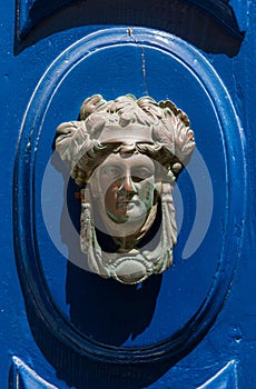 Decorative bronze door handle in the form of a beautiful woman`s