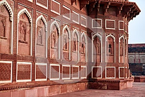 Decorative buildings and walls inside of Agra red fort in India, beautiful architecture elements