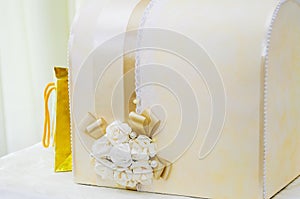 Decorative casket. Decoration with ribbons and paper flowers. Festive decorations