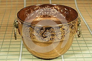 Decorative cauldron of copper
