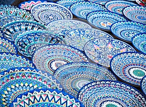 Decorative ceramic plates with traditional uzbekistan ornament o