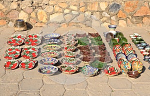 Decorative ceramic plates with traditional uzbekistan ornament on street market, Central Asia, Silk Road