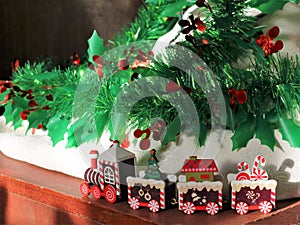 Decorative children`s train toy under the tree