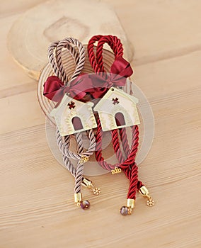 Decorative Christmas lucky charms 2020 with metallic houses and ribbons