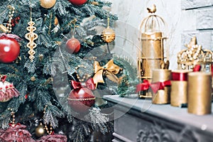 Decorative Christmas tree branches with candle ,Christmas candles decoration with flowers on a table