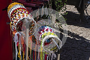 Decorative colourful garlands or tiaras at a historical re-enactment party, Portugal