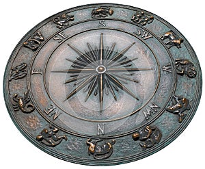 decorative compass on the cement ground isolated on white with clipping path