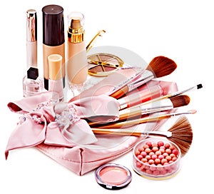 Decorative cosmetics and flower.