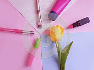 Decorative cosmetics, tulip flower glamor   concept  collection colorful on a colored background