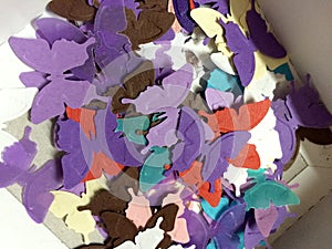 Butterflies confetti in a box for decorators photo