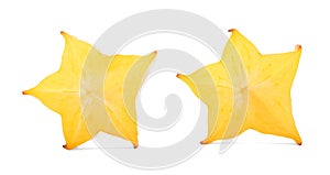 Decorative cut carambola fruit with a star-shaped cross section, isolated on a white background. Carambola for summer drinks.