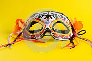 Decorative Day of the Dead or Dia de los Muertos mask or Halloween mask. Calaveras or Calaca photo
