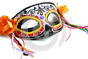Decorative Day of the Dead or Dia de los Muertos mask or Halloween mask. Calaveras or Calaca photo