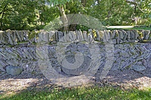 A decorative Dry Stone wall on the edge of the Murton Lochs Nature Reserve