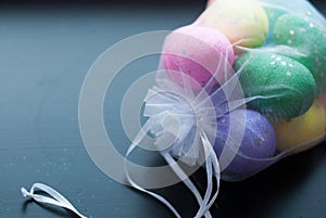 Decorative eggs in transparent bag.