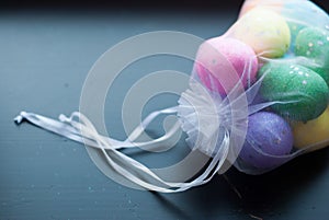 Decorative eggs in transparent bag.