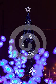 Decorative electrics tree bulbs flowers on New Year Eve